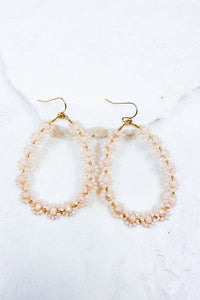 Floral beaded tear drop earrings in ivory