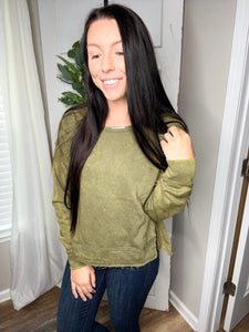Acid wash exposed seam pull over in olive or