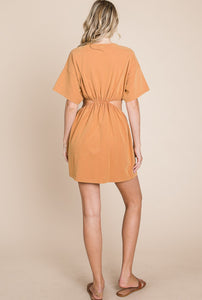 Pumpkin colored cut out dress with pockets