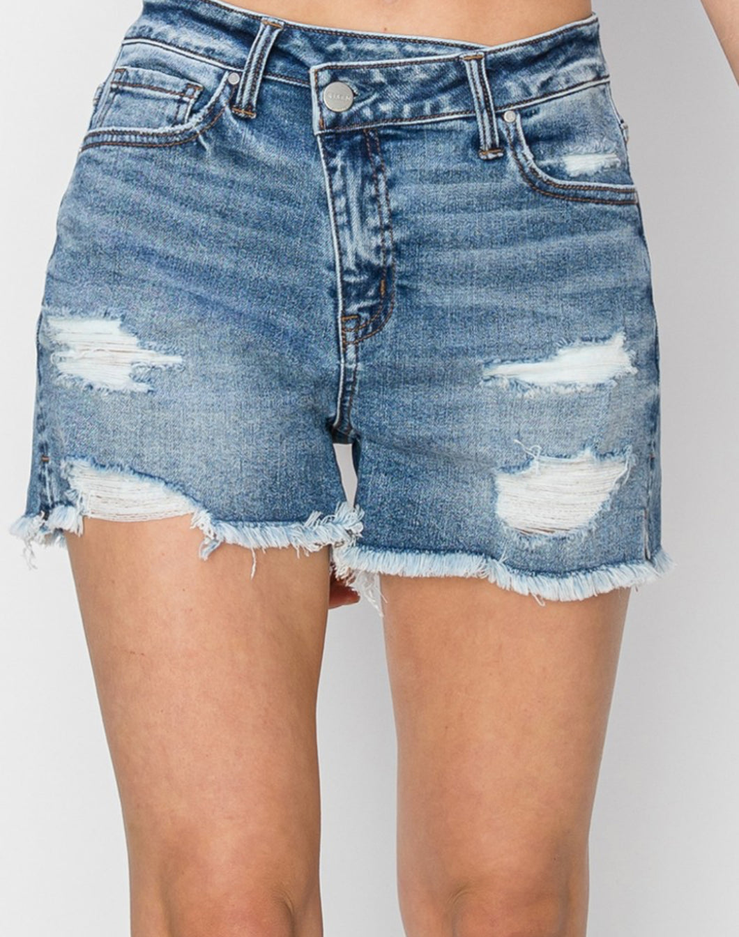 Criss cross button distressed shorts