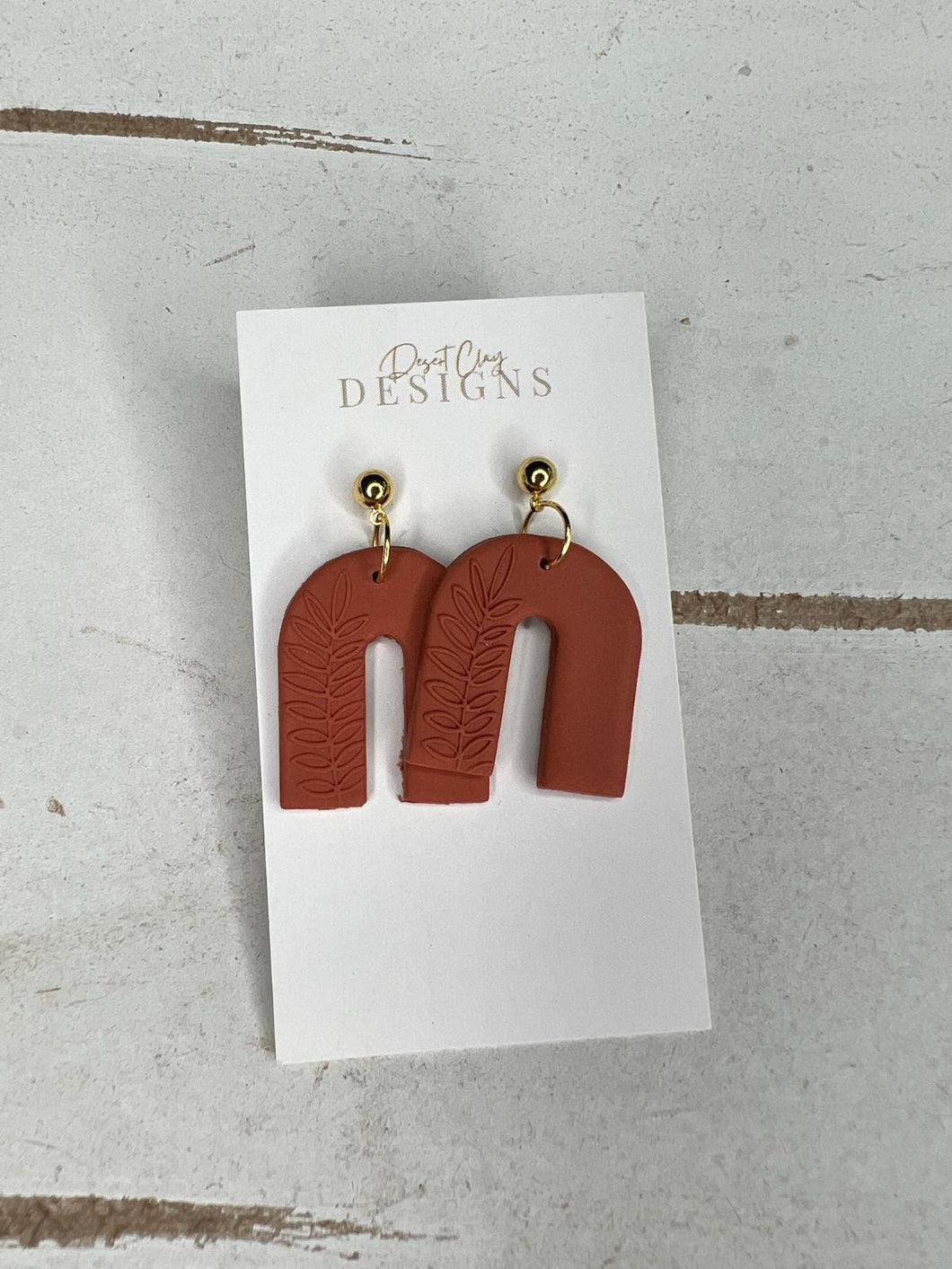 Casey arch earrings with leaves